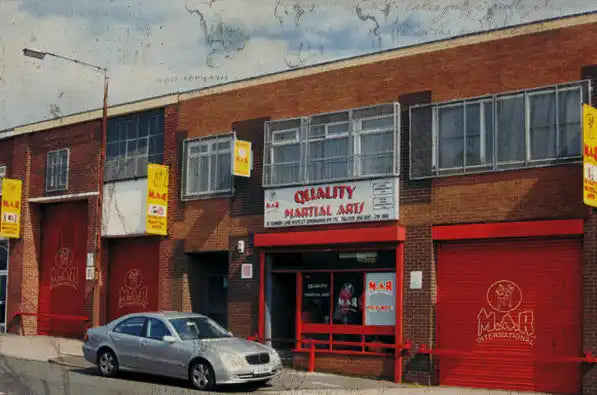 Brick building with red doors.