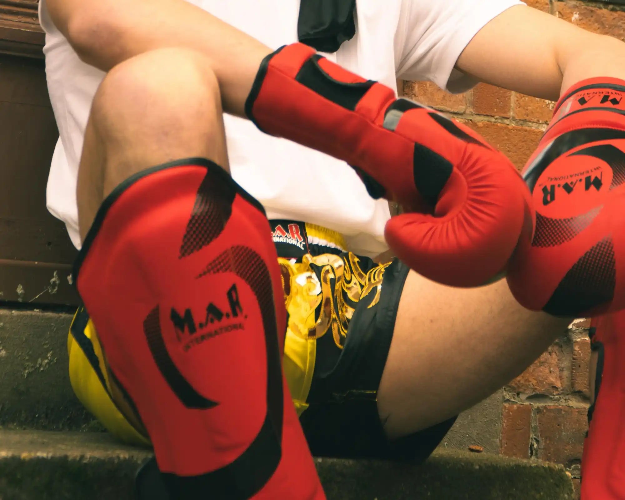 Muay Thai fighter with protective gear.