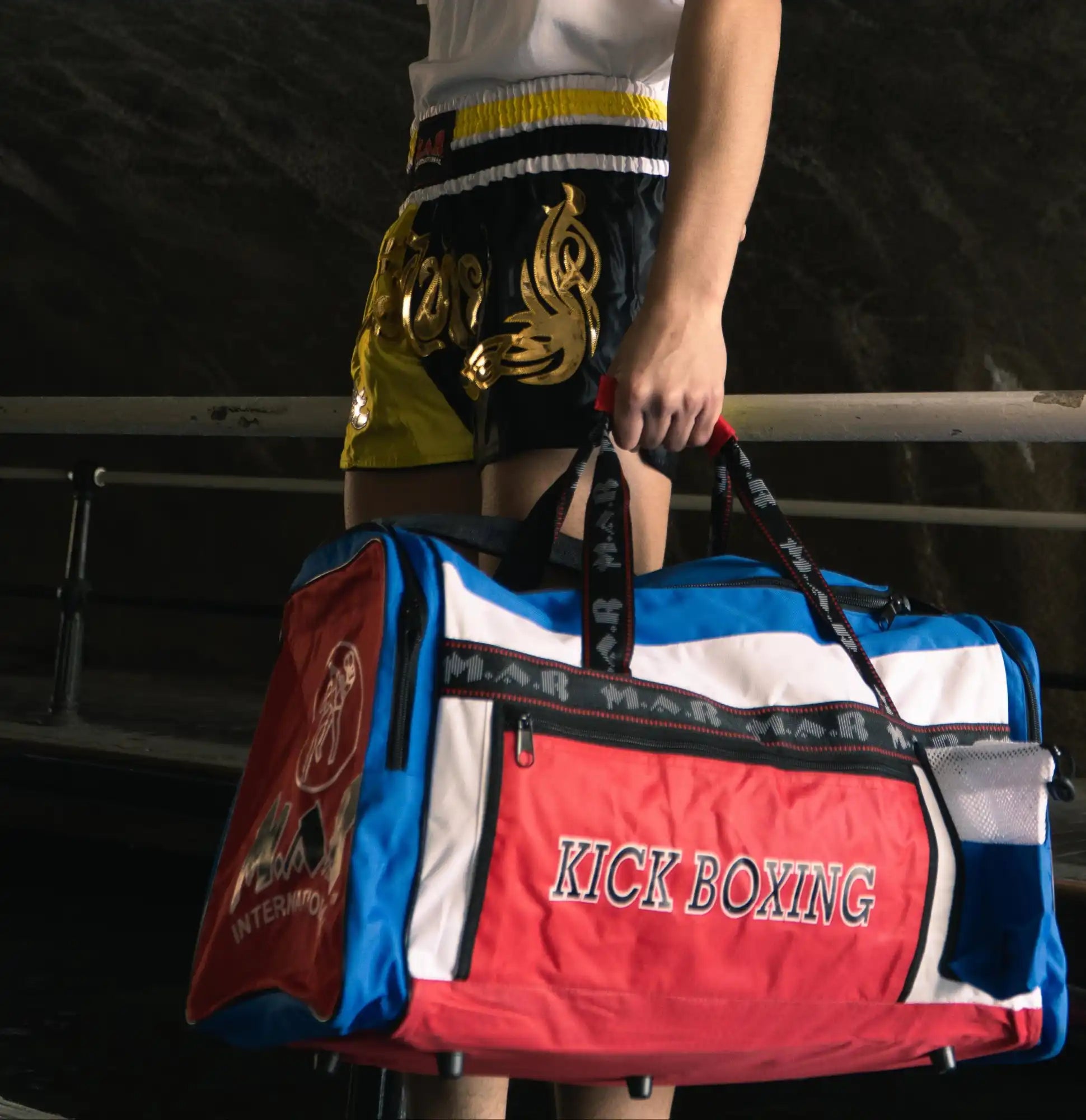 Red, white, and blue kickboxing gym bag.